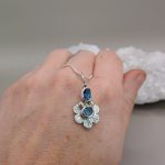 "Nature Details - A belső béke virága" - topáz ezüst amulett