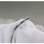 "Az élet áramlása" - kézzel vésett ezüst gyűrű topázzal
