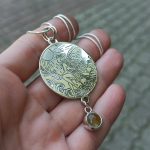"A tündér melegsége ezüst talizmán"