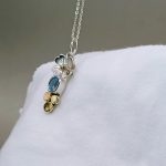 "A természet és védelem szent egysége" - kézzel készült arany, és ezüst amulett topázzal